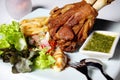 Fried pork leg and French fries.