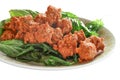 Fried pork minced balls with fried basil on white background Royalty Free Stock Photo