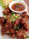 Fried pork ribs on dish, Thai Food, Thailand.