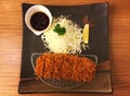 Fried pork set on the wooden table