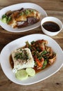 Fried pork with sweet basi and white jasmine sticky rice