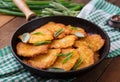 Fried potato pancakes in a frying pan Royalty Free Stock Photo