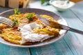 Fried potato pancakes on the old wooden background Royalty Free Stock Photo