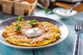 Fried potato pancakes on the old wooden background side view Royalty Free Stock Photo