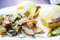 Fried Potatoes and Eggs Benedict Royalty Free Stock Photo