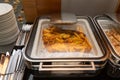 Fried potatoes garnish in a food warmer