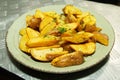 Fried potatoes with herbs