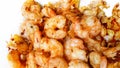 Fried prawns with garlic isolated on white background Royalty Free Stock Photo