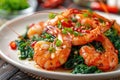 Fried prawns or shrimps with spinach, chili and garlic in white plate Royalty Free Stock Photo