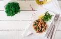 Fried prawns or shrimps with spinach, chili and garlic in white plate. Royalty Free Stock Photo