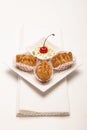 Fried puff pastries with dip. Conceptual image