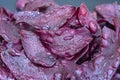 Fried purple sweet potato chips as snacks, close up Royalty Free Stock Photo