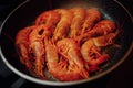 Fried red shrimps with hot oil on pan Royalty Free Stock Photo