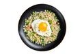 Fried rice with chicken, egg and vegetables in a plate. Isolated on white background. Royalty Free Stock Photo