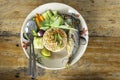 Fried rice with chili spicy with fish and vegetables in white plate on wooden table Royalty Free Stock Photo