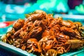 Fried rice field crabs with salt and pepper on a food stall Royalty Free Stock Photo