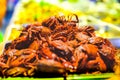 Fried rice field crabs with salt and pepper on a food stall Royalty Free Stock Photo