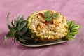 Fried rice food serve in pineapple fruit carving Royalty Free Stock Photo