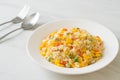 Fried rice with mixed vegetable carrot, green bean peas, corn and egg