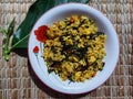 Fried rice Noni leaves, on woven water hyacinth leaves Royalty Free Stock Photo