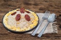 fried rice with sausage egg on wood background. Royalty Free Stock Photo