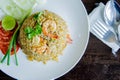 Fried rice with shrimp in a white dish on wood table in thai foo Royalty Free Stock Photo