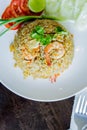 Fried rice with shrimp in a white dish on wood table in thai foo Royalty Free Stock Photo