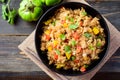 Fried rice with vegetables in cooking pan