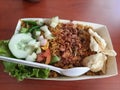 Fried rice with vegetables and emping crackers