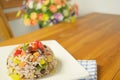 Fried rice vegetarian with blue fabric on wood table