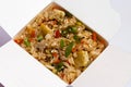 Fried rice wok with scrambled eggs and vegetables in a box Royalty Free Stock Photo