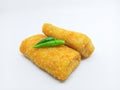 Fried Risoles or Risol Mayo (Traditional food) with a chili isolated on the white background Royalty Free Stock Photo