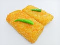 Fried Risoles or Risol Mayo (Traditional food) with a chili isolated on the white background Royalty Free Stock Photo