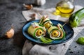 Rolled zucchini slices stuffed with bacon, cream cheese and olive