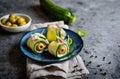 Rolled zucchini slices stuffed with bacon, cream cheese and olive Royalty Free Stock Photo