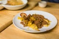 Fried roti topping with condense milk and chocolate power at the dessert cafe in Chiang Mai, Thailand