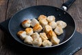 Fried russian dumplings in a pan