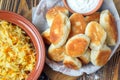 Fried russian pastry pirozhki on wooden background. Royalty Free Stock Photo