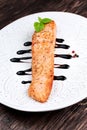 Fried salmon fillet served with reduced balsamic vinegar Royalty Free Stock Photo