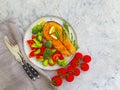 Fried salmon slice seafood on a plate, tomato on concrete background Royalty Free Stock Photo