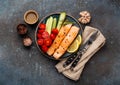 Fried salmon steak and vegetables