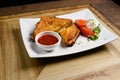 Fried sandwich with salad and dip