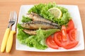 Fried sardines with salad