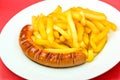 Fried sausage with french fries Royalty Free Stock Photo