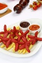 Fried sausage with french fries Royalty Free Stock Photo