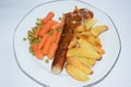 curry sausage with French Fries and vegetables Royalty Free Stock Photo