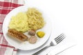 Fried sausage with pickled cabbage, mashed potatoes and mustard Royalty Free Stock Photo