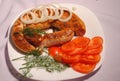 Fried sausage on a plate Royalty Free Stock Photo