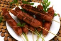 Fried sausages with parsley on dish