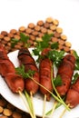 Fried sausages with parsley on dish